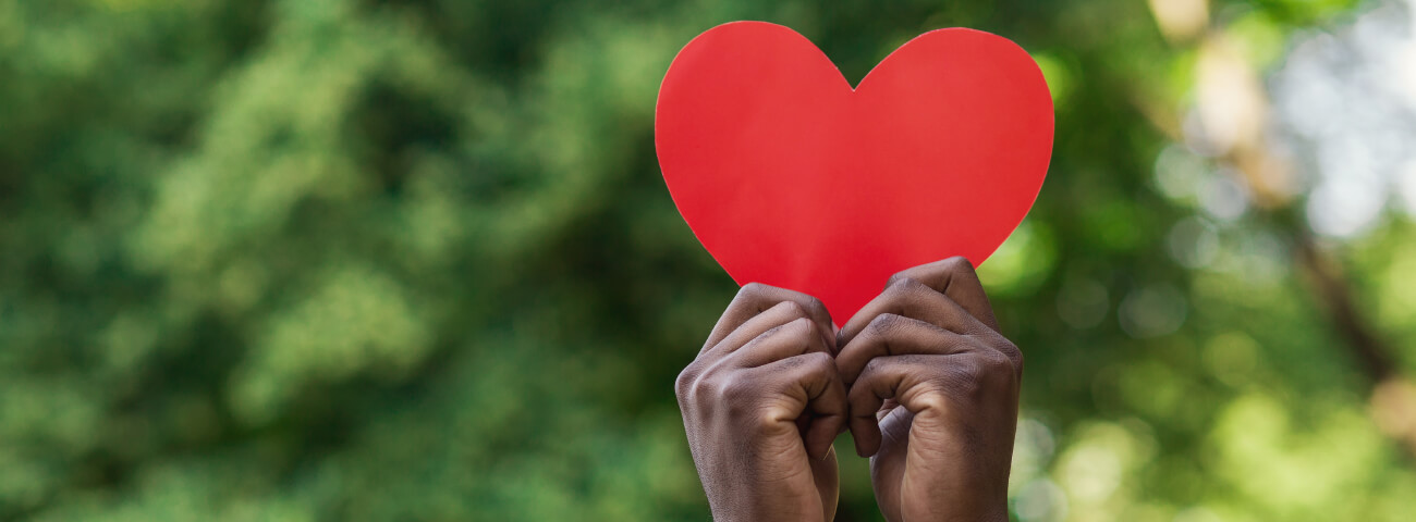 Ameritas_Response_Covid19_HERO-01 Two hands holding up a heart