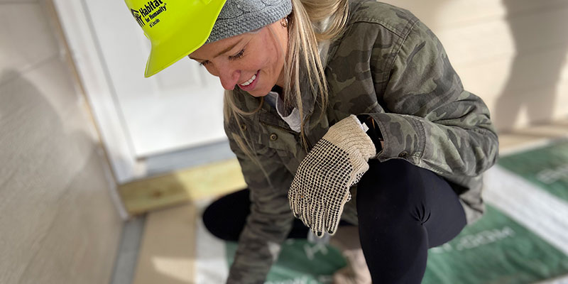 Female volunteering for Habitat for Humanity.