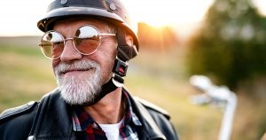 Man on motorcycle at dusk