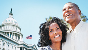 Couple standing in front of the U.S. capital.