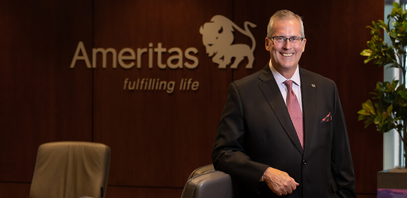 Ameritas President and CEO Bill Lester stands in the boardroom at Ameritas' home office