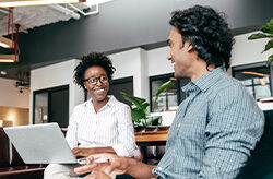 Professionals working together in office