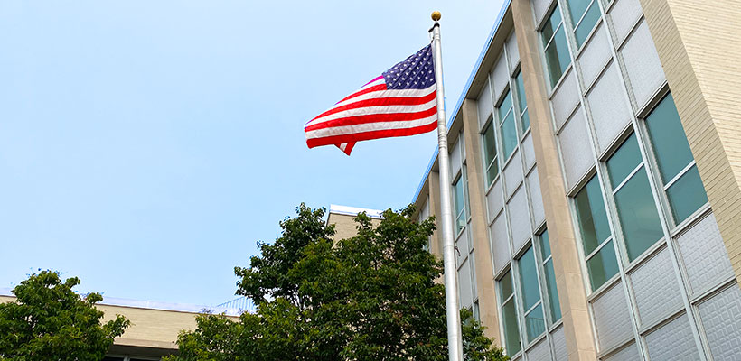 American flag hangs outside of Ameritas home office in Lincoln, Nebraska on a sunny day