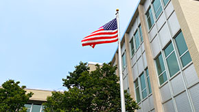 American flag hangs outside of Ameritas home office in Lincoln, Nebraska on a sunny day