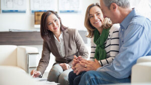 three people meeting