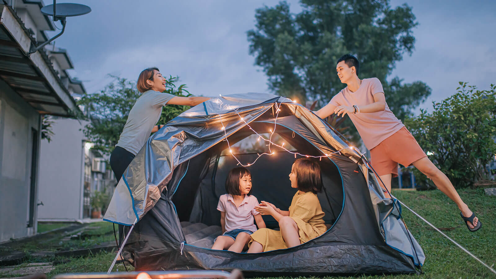 family camping in back yard