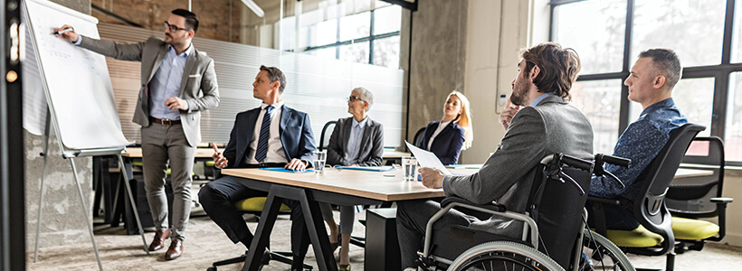 Business colleagues sitting at a table during a meeting.