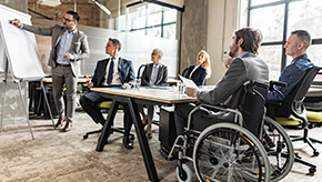 Business colleagues sitting at a table during a meeting.