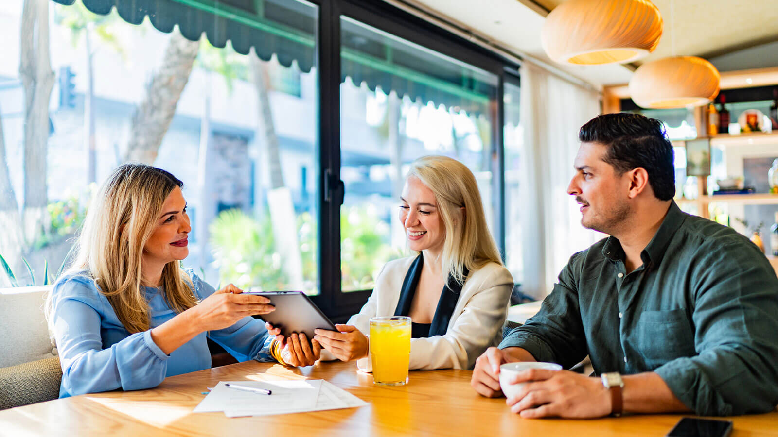 A married couple meets with their financial professional to learn about the differences in permanent life insurance versus term life insurance. A married couple meets with their financial professional to learn about the differences in permanent life insurance versus term life insurance.
