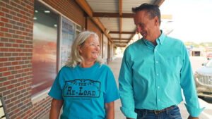 Rhonda Barth and Gary Barth, walking and sharing a conversation.