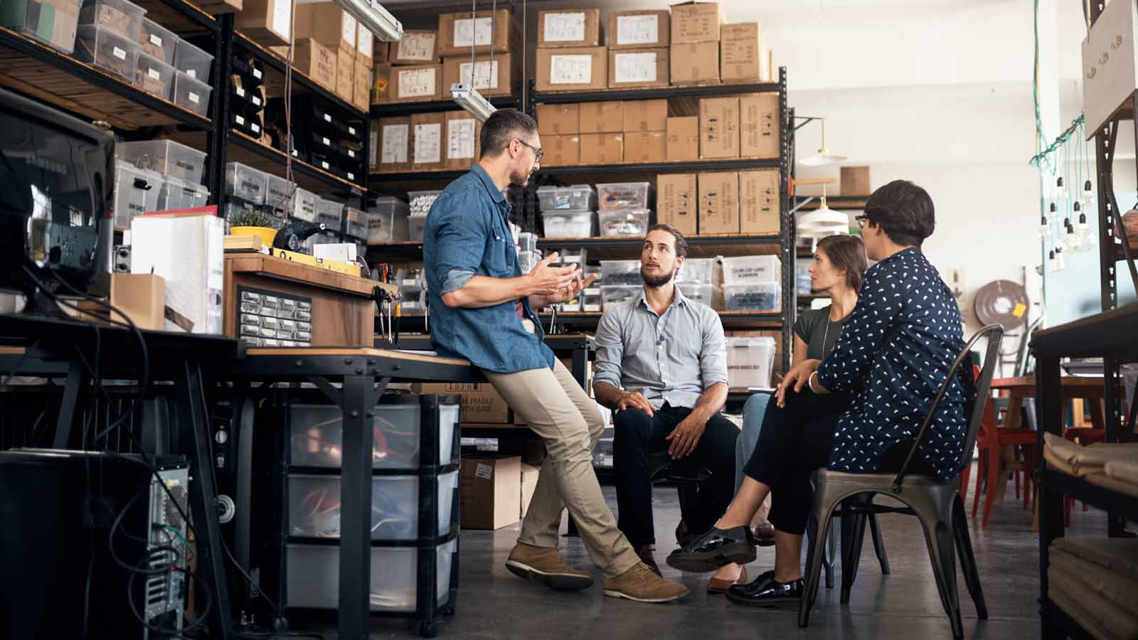 Employees having a discussion about the value of employee benefits